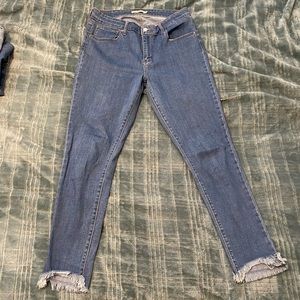 LEVIS 721 high rise skinny distressed jeans